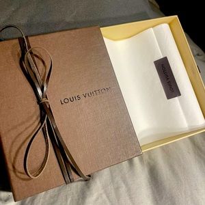 Louis Vuitton box with white tissue paper. Wrapped in original genuine leather.